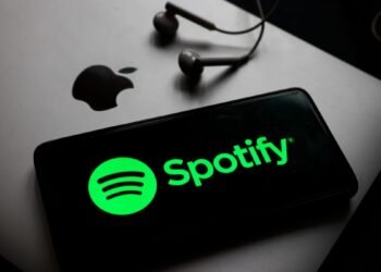 Spotify US app update, Spotify Apple App Store, Spotify external payment links, Spotify pricing information, Apple App Store policy, Spotify antitrust, Spotify subscription pricing, Spotify Apple approval, Spotify app update purchase links, Apple commission, Off-app purchases, Judge Yvonne Gonzalez Rogers, Epic Games lawsuit, Apple Music competition, Spotify annual profit, Streaming service, Music app, Spotify US app update shows pricing and external links, Apple approves Spotify app update with purchase link option, Spotify circumvents Apple App Store commission with new update, How to purchase Spotify subscription outside the Apple App Store, Impact of Apple's App Store policy change on Spotify, Spotify gains Apple approval after antitrust ruling, Spotify vs Apple App Store fees,